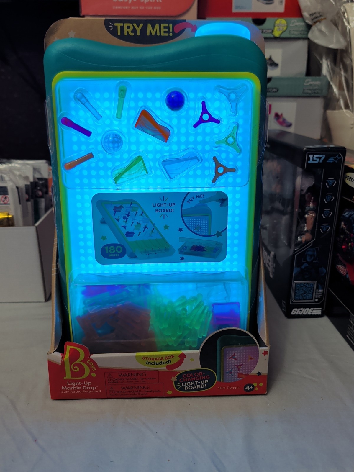 B. Toys 180-Piece Color-Changing Light-Up Board With Peg & Marble Run Set