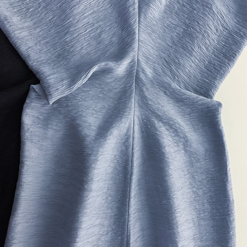 Elegant and textured pleated waist length dress with aura level
