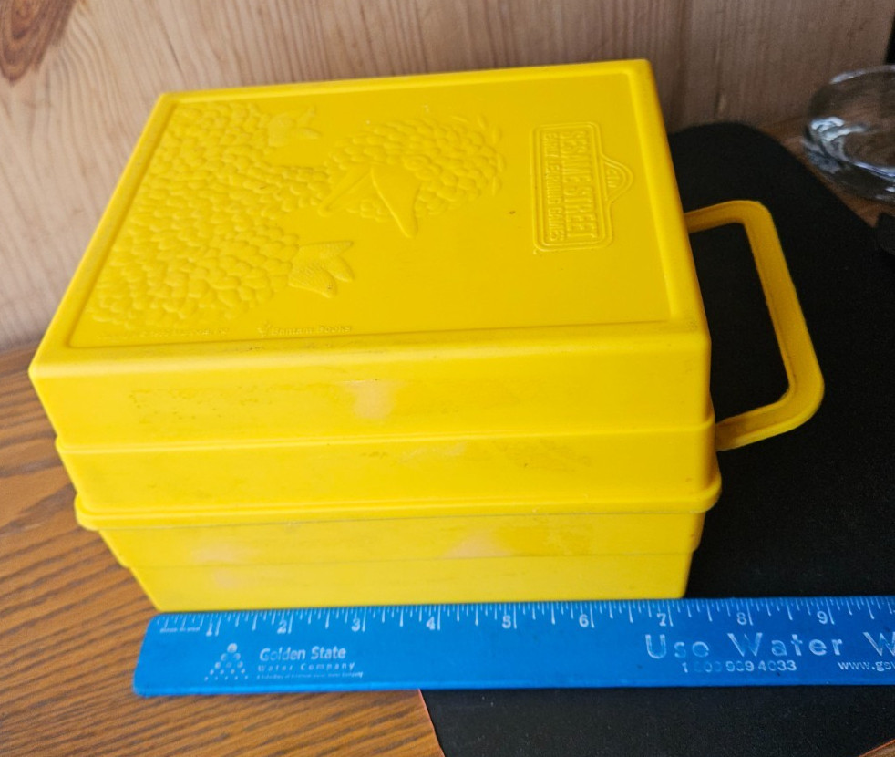 SESAME STREET EARLY LEARNING GAMES. VINTAGE YELLOW CARRY CASE. BIG BIRD IMAGE