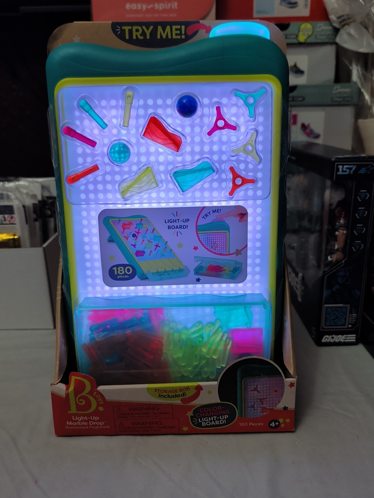 B. Toys 180-Piece Color-Changing Light-Up Board With Peg & Marble Run Set
