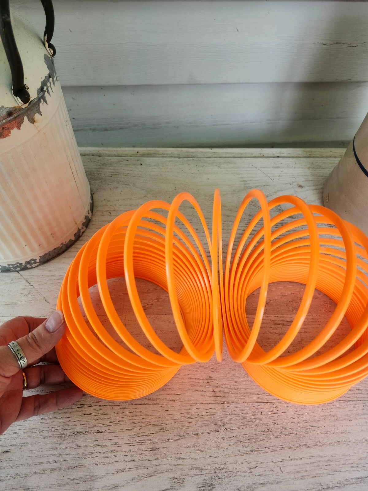 Giant Slinky – Green, Yellow, Orange or Pink 5.25″ diameter in opening, 5.25″ i