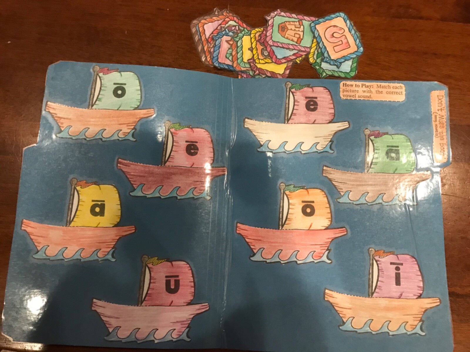 Don’t Miss the Boat! Long short vowels 1st grade language arts file folder game