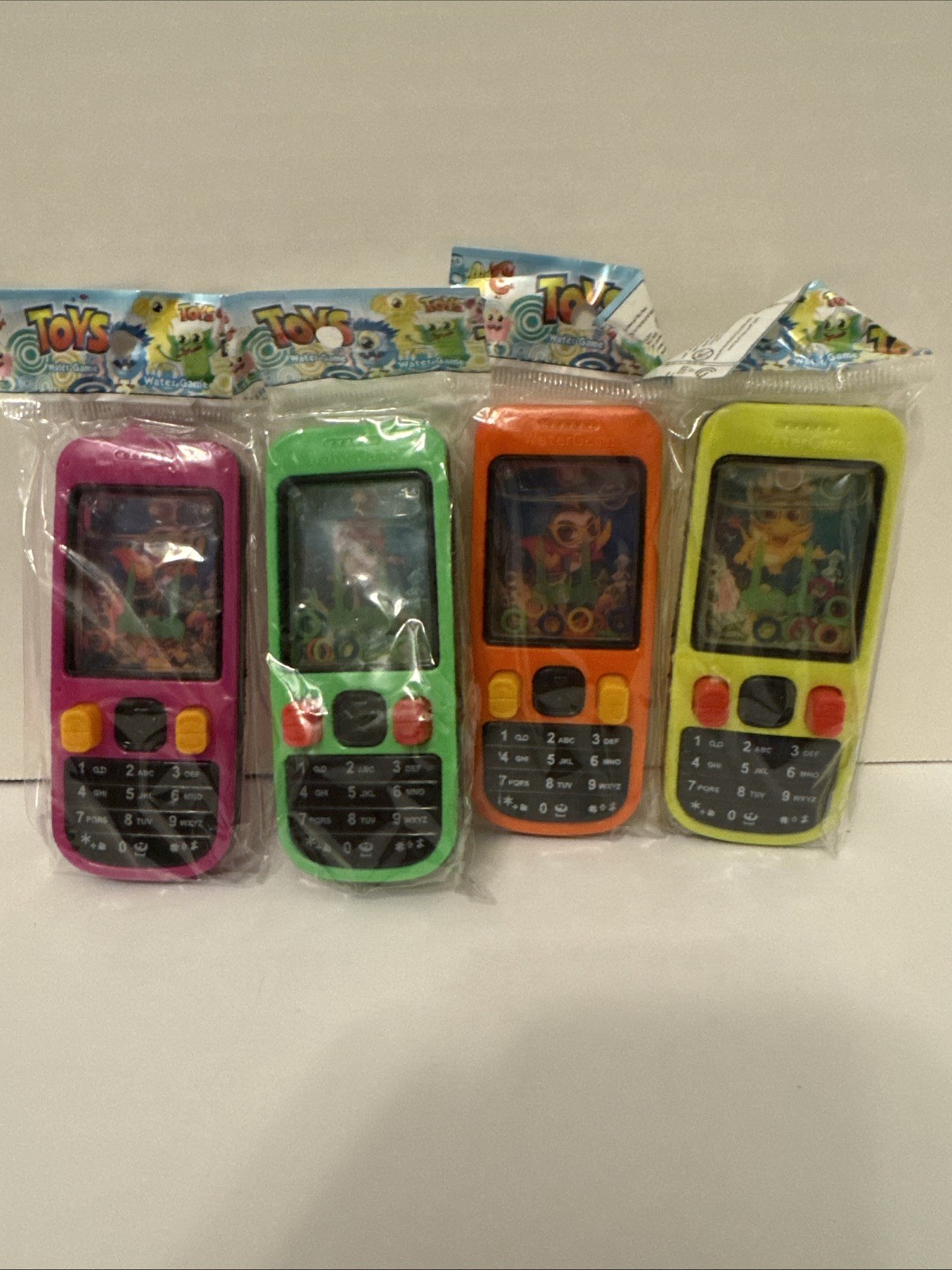 4 Piece-HONTEAM Phone Shape And Handheld MINI Classic Water Game Toy