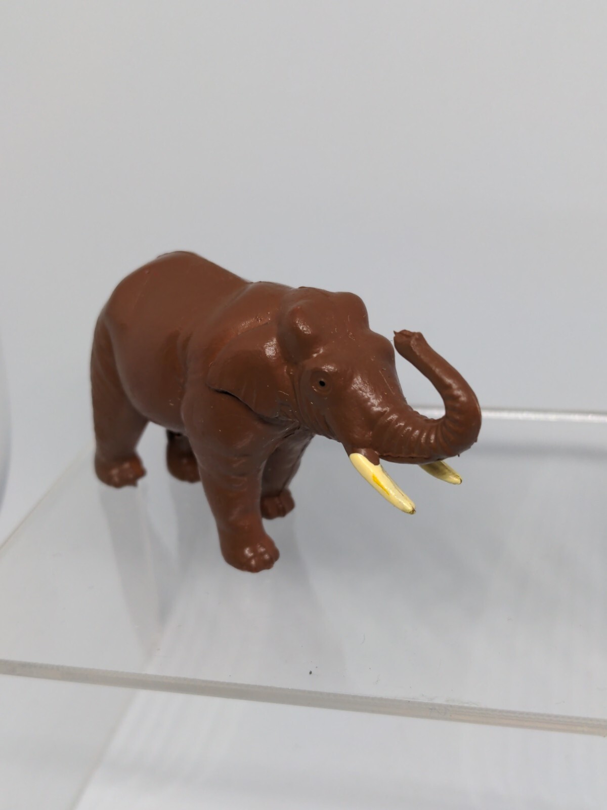 Elephant Asian Replica plastic 3 inches long Dark Brown Tusk