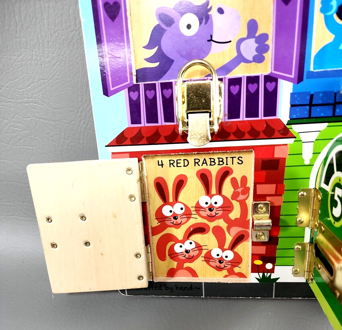 Melissa & Doug Learning -Latches, Buckle, Hook, Numbers, & Colors Activity Board