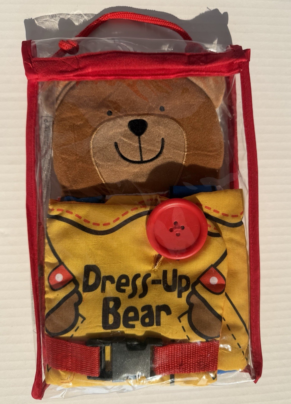 Melissa & Doug K’s Kids Dress-Up Bear Multicolor Soft Book Activity Toy