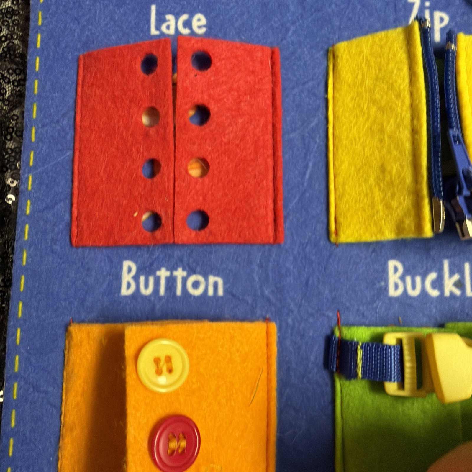 Busy Board to learn zippers buttons laces buckles ties snaps