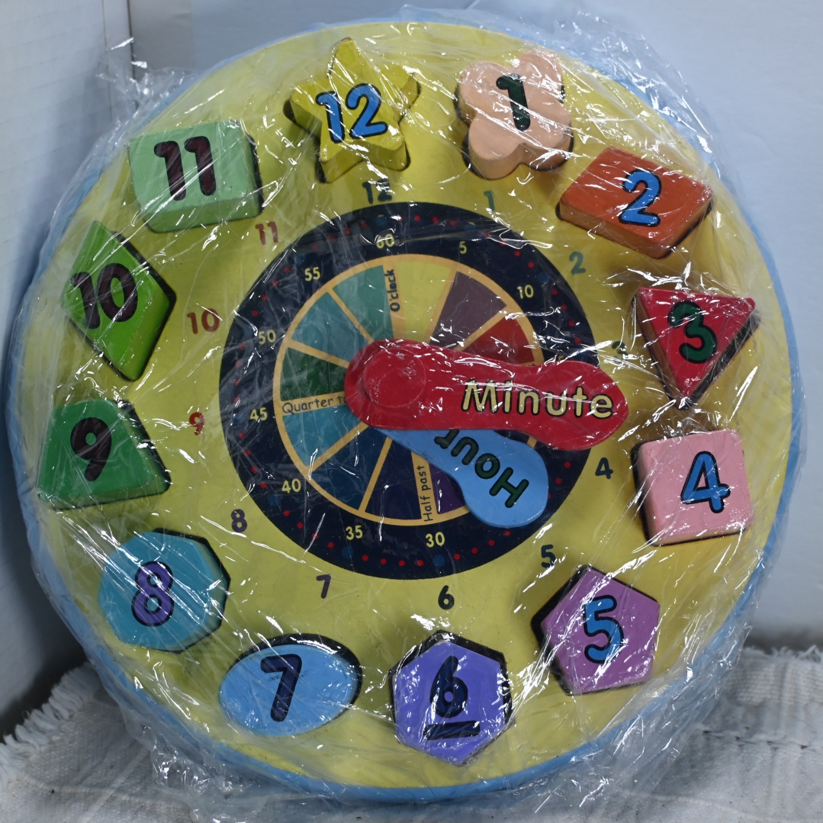 Melissa & Doug shape sorting clock to teach shapes and how to tell time