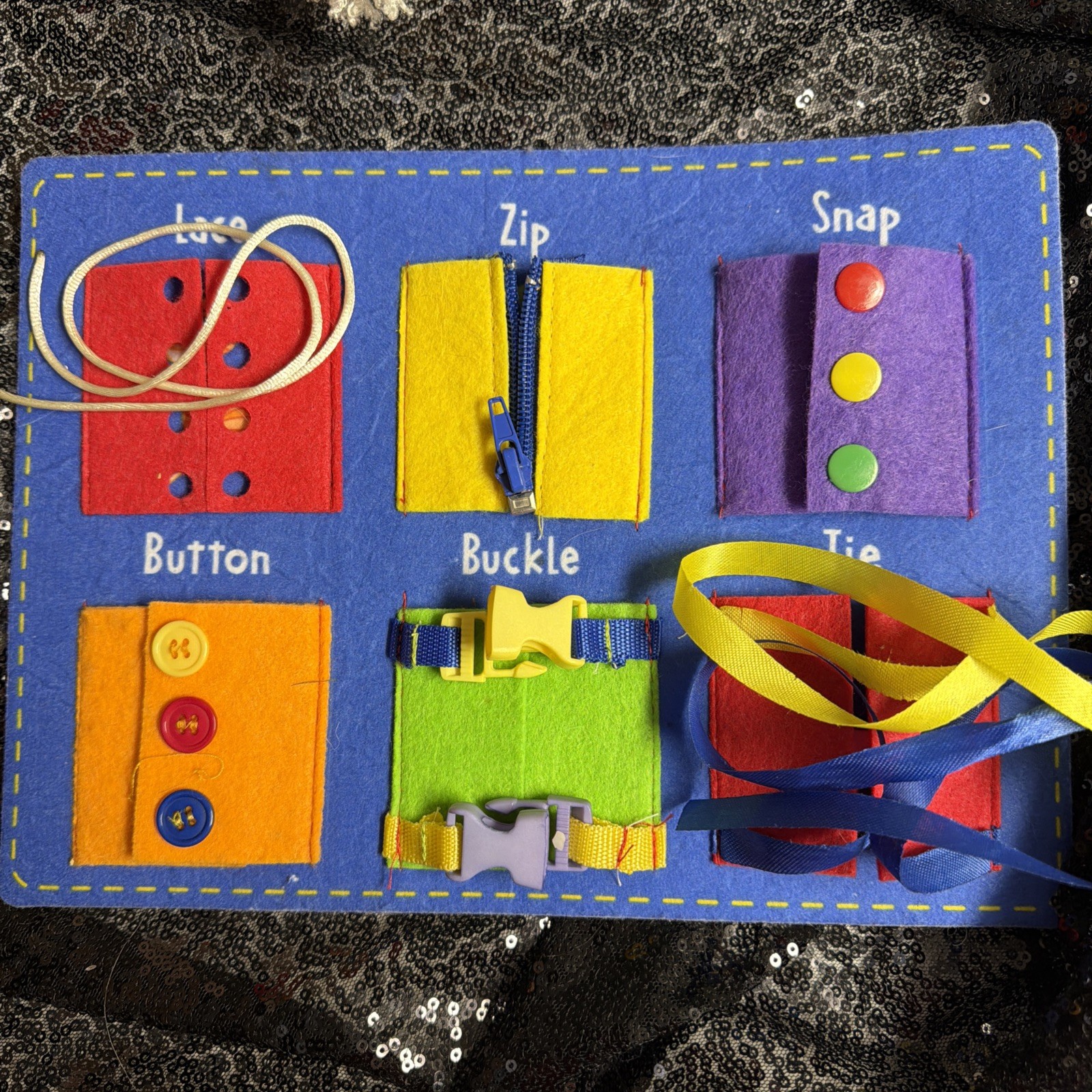 Busy Board to learn zippers buttons laces buckles ties snaps