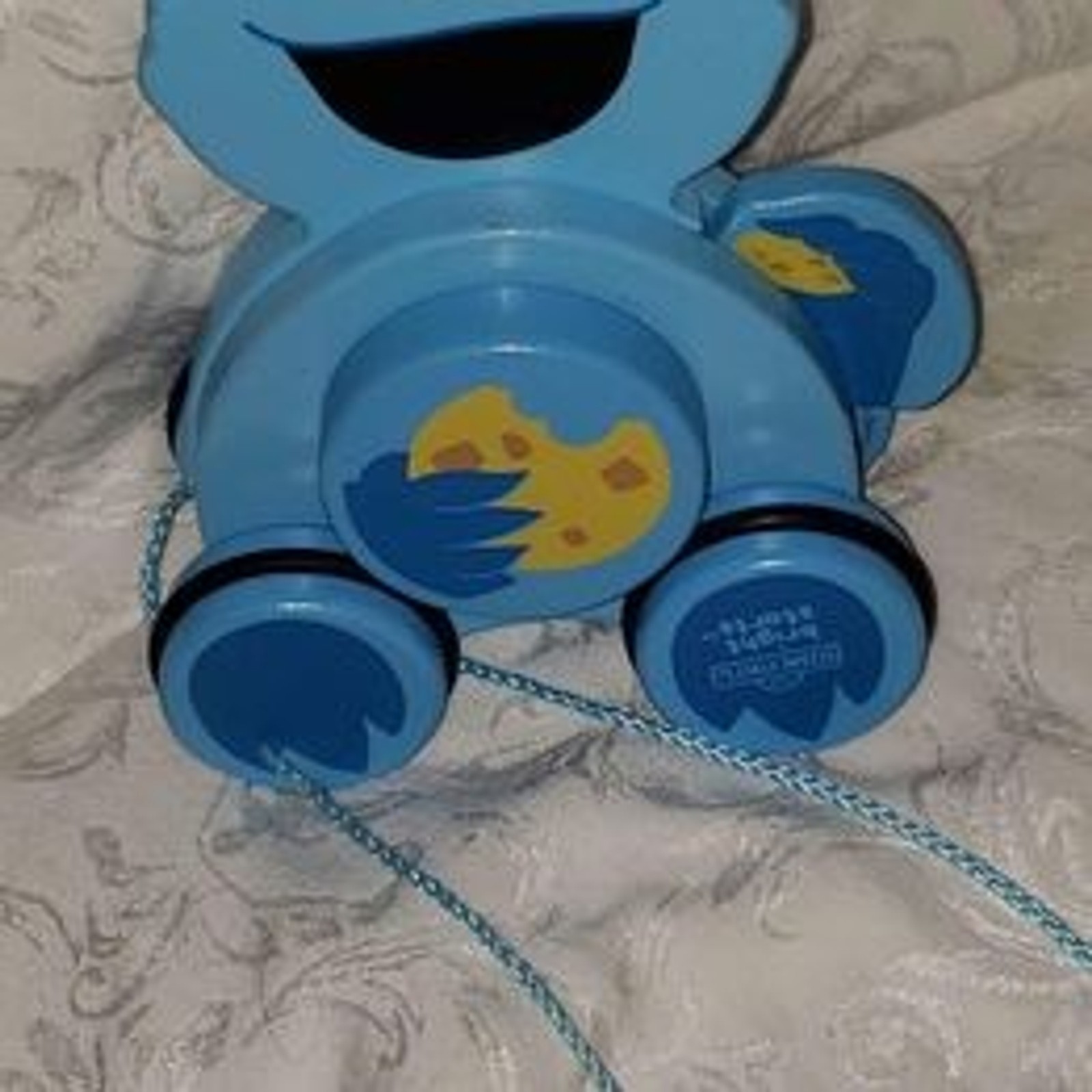 Bright Starts Sesame Street Cookie Monster Snack & Stroll Wooden Pull Toy