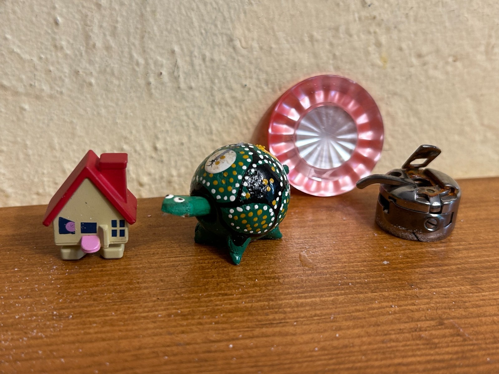 Dozen sand tray figures focus on change, challenges, growth, and stability