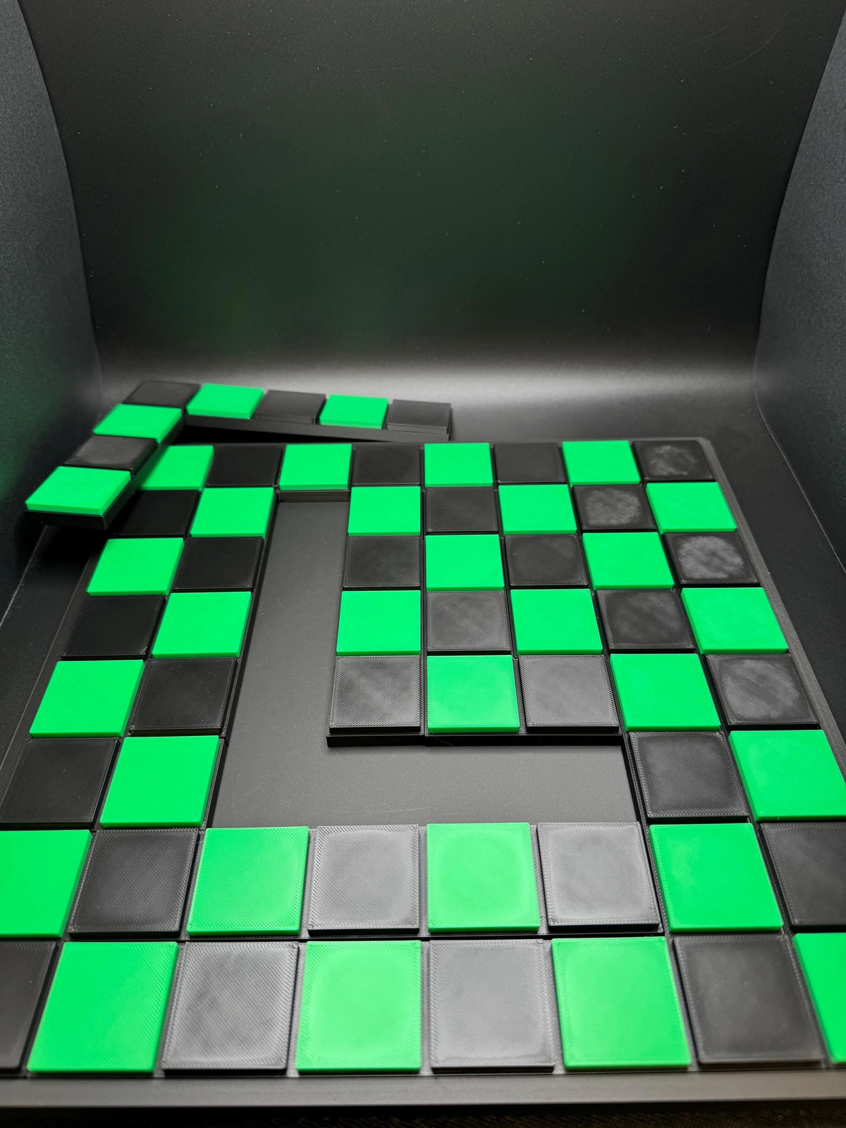 Checkerboard Dissection Puzzle by Sam Loyd