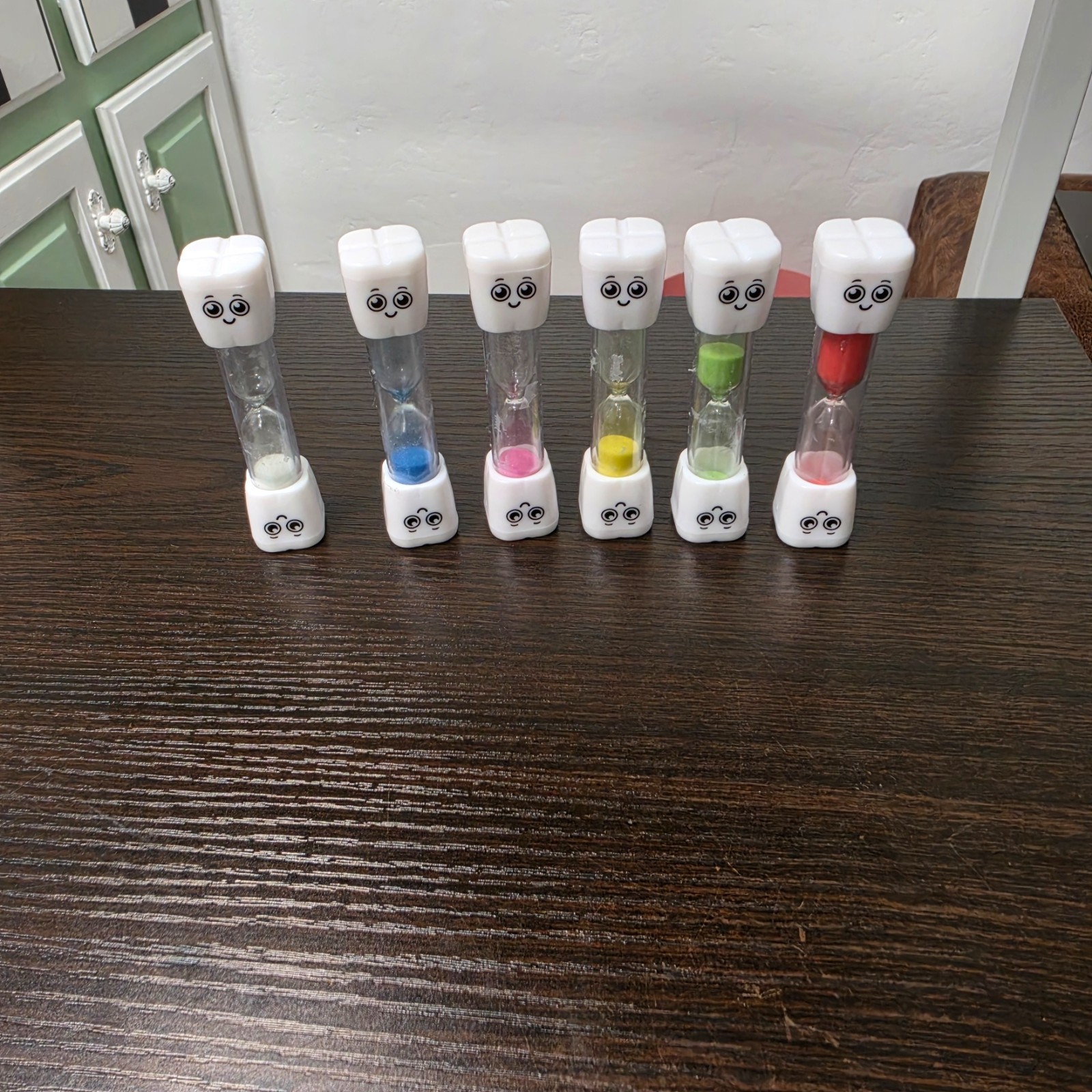 SuLiao toothbrush sand timers designed for children with various uses.