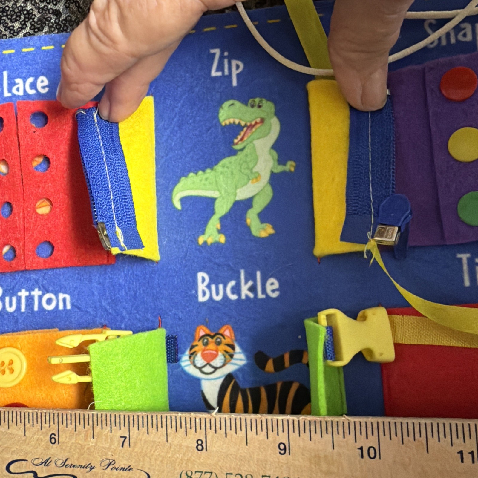 Busy Board to learn zippers buttons laces buckles ties snaps