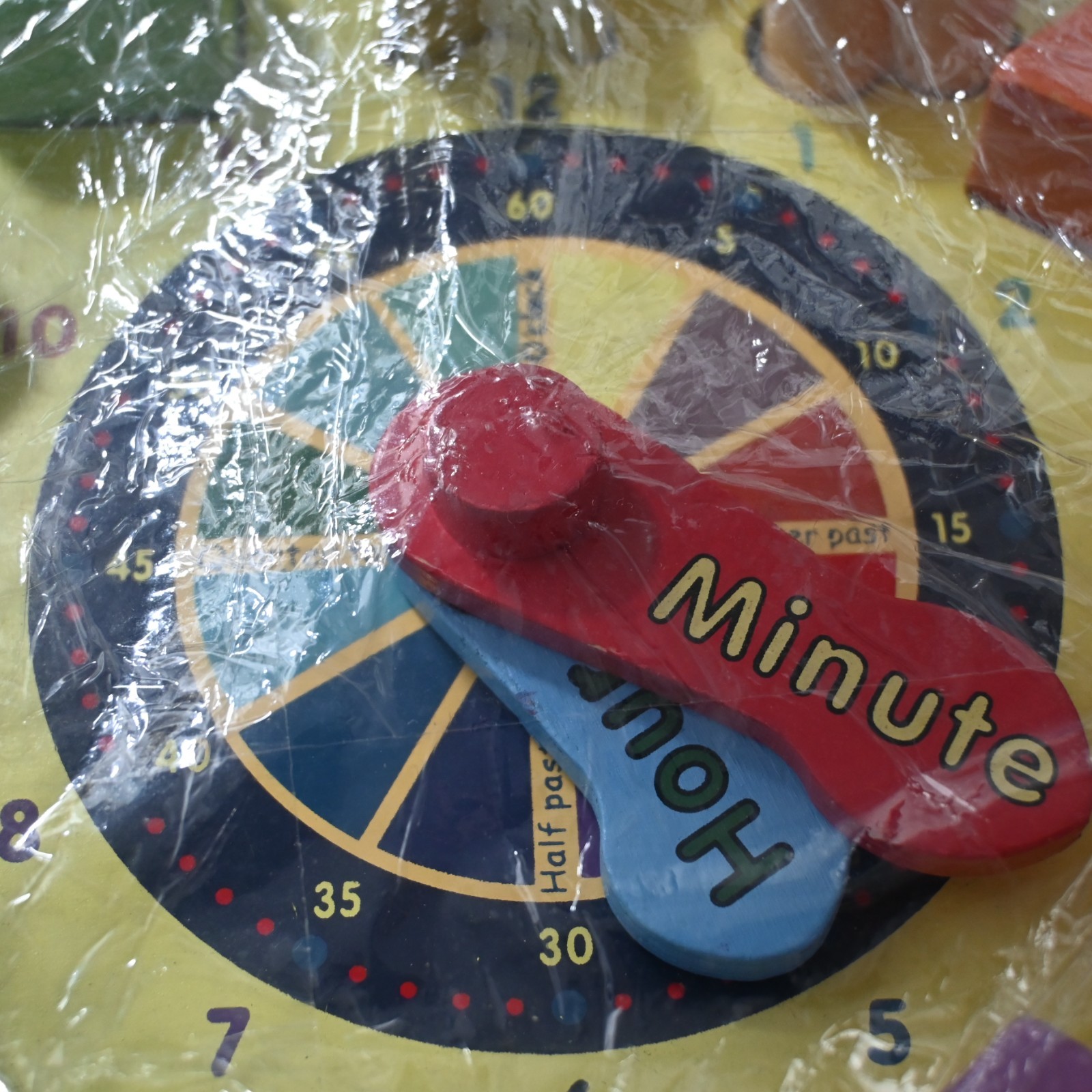 Melissa & Doug shape sorting clock to teach shapes and how to tell time