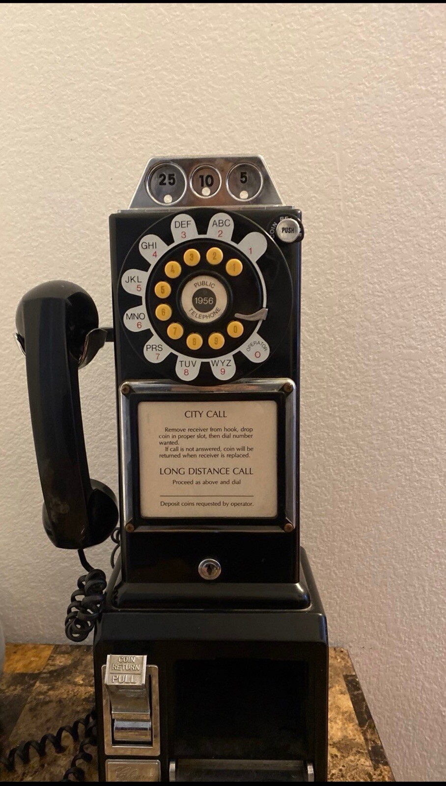 Black Phone With Coin Catcher
