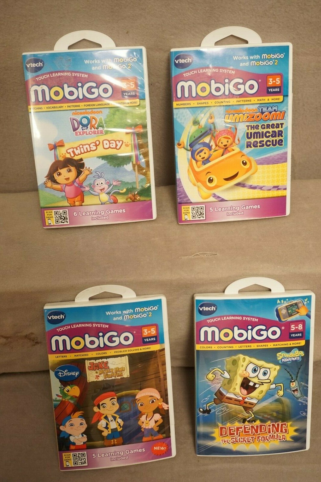 Vtech MobiGo programs: Umizoomi, Dora Twins Day, Jake Neverland Pirates or Spong