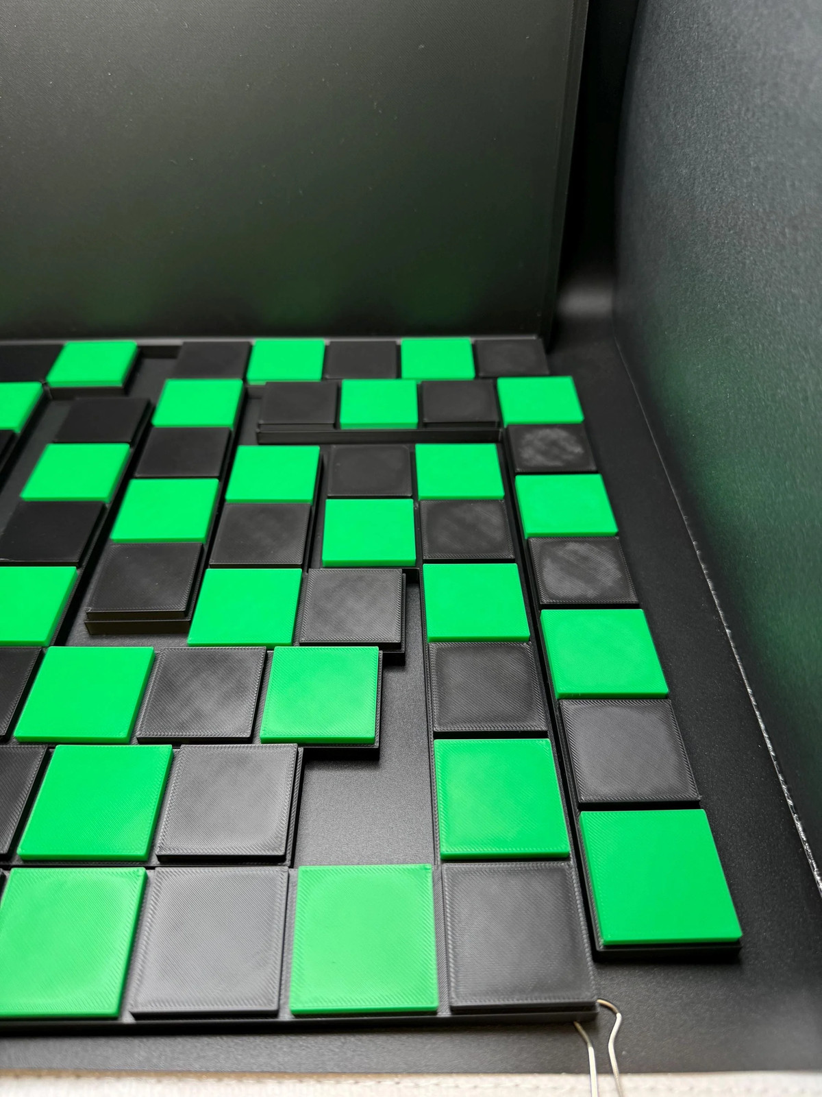 Checkerboard Dissection Puzzle by Sam Loyd