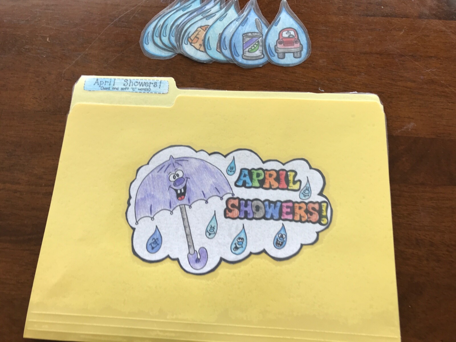 April Showers! Hard soft “c” words 1st grade language arts file folder game