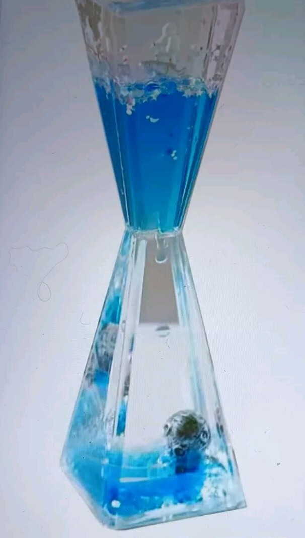 Liquid Hourglass Resin Statue Moonman Figurine With Lighted Base