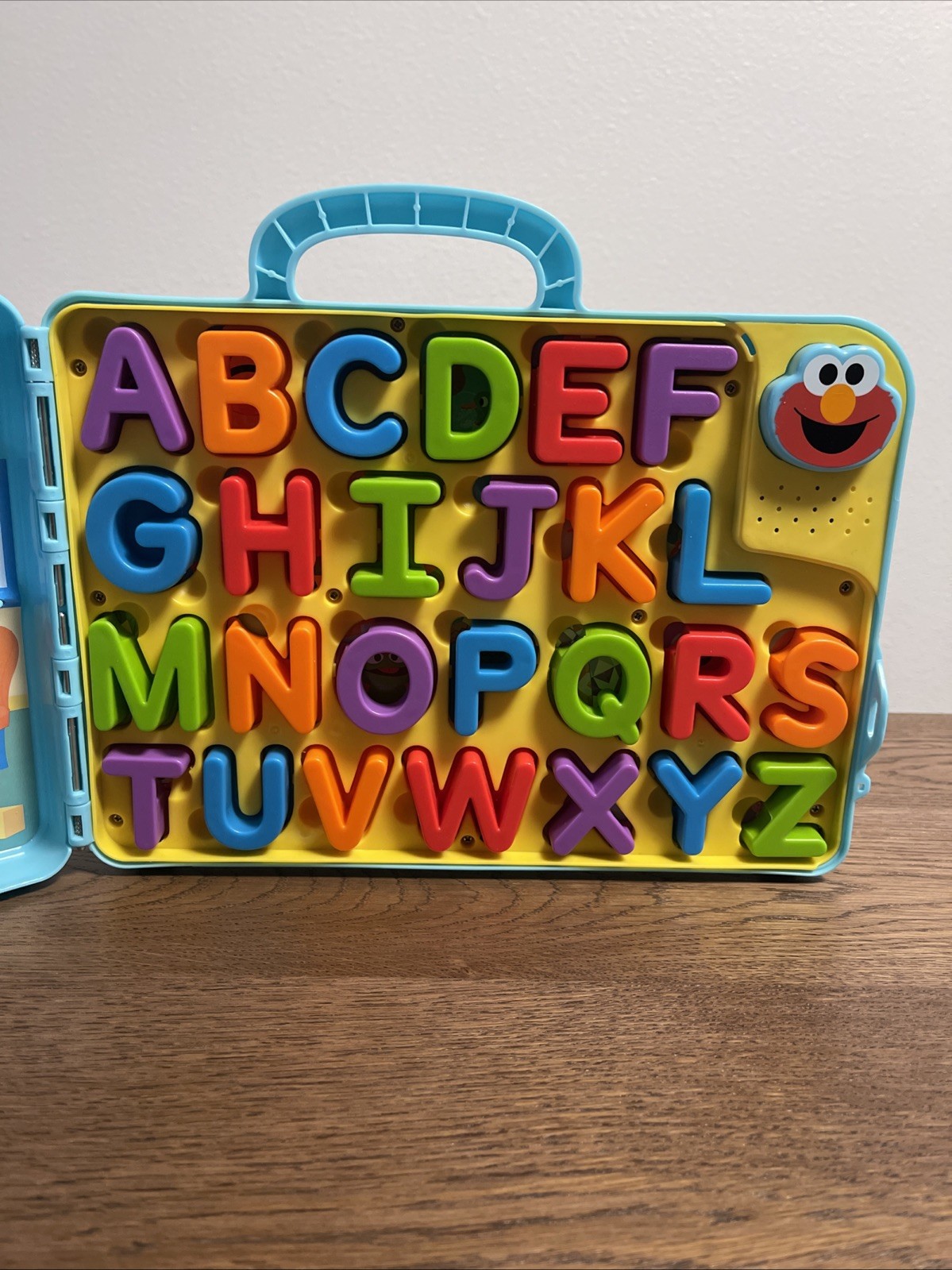 Sesame Street Elmo’s Learning Letter Bus Activity Board