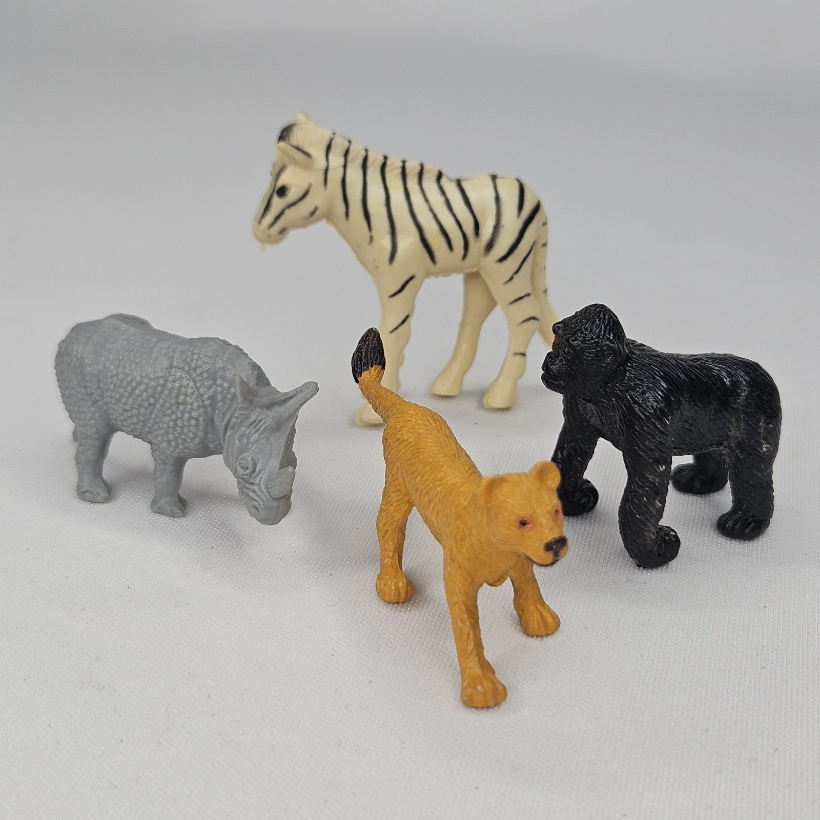 4 lot Vintage Rubber Zoo Jungle Safari Animals K&M Int Zebra Gorilla Lion Rhino