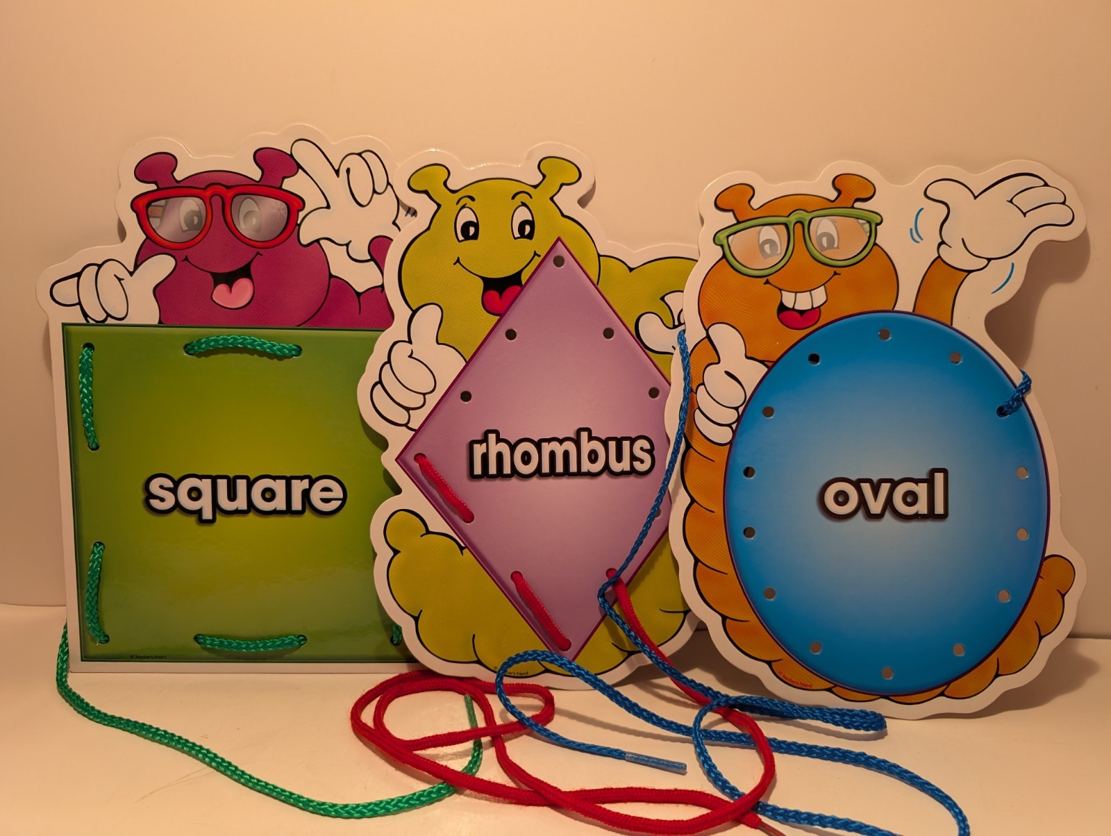 10 Piece Lacing Activity: Shapes with Matching Cards and Laces