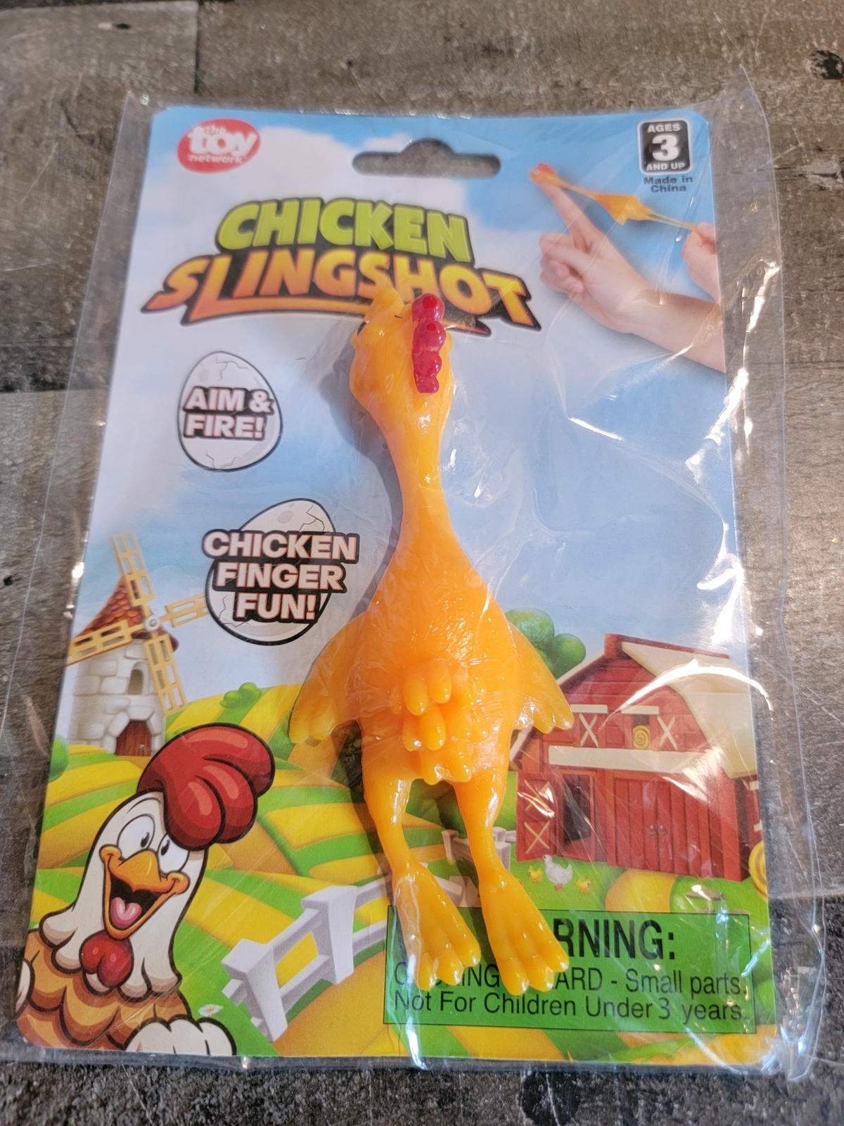Toy Network chicken finger slingshot figure