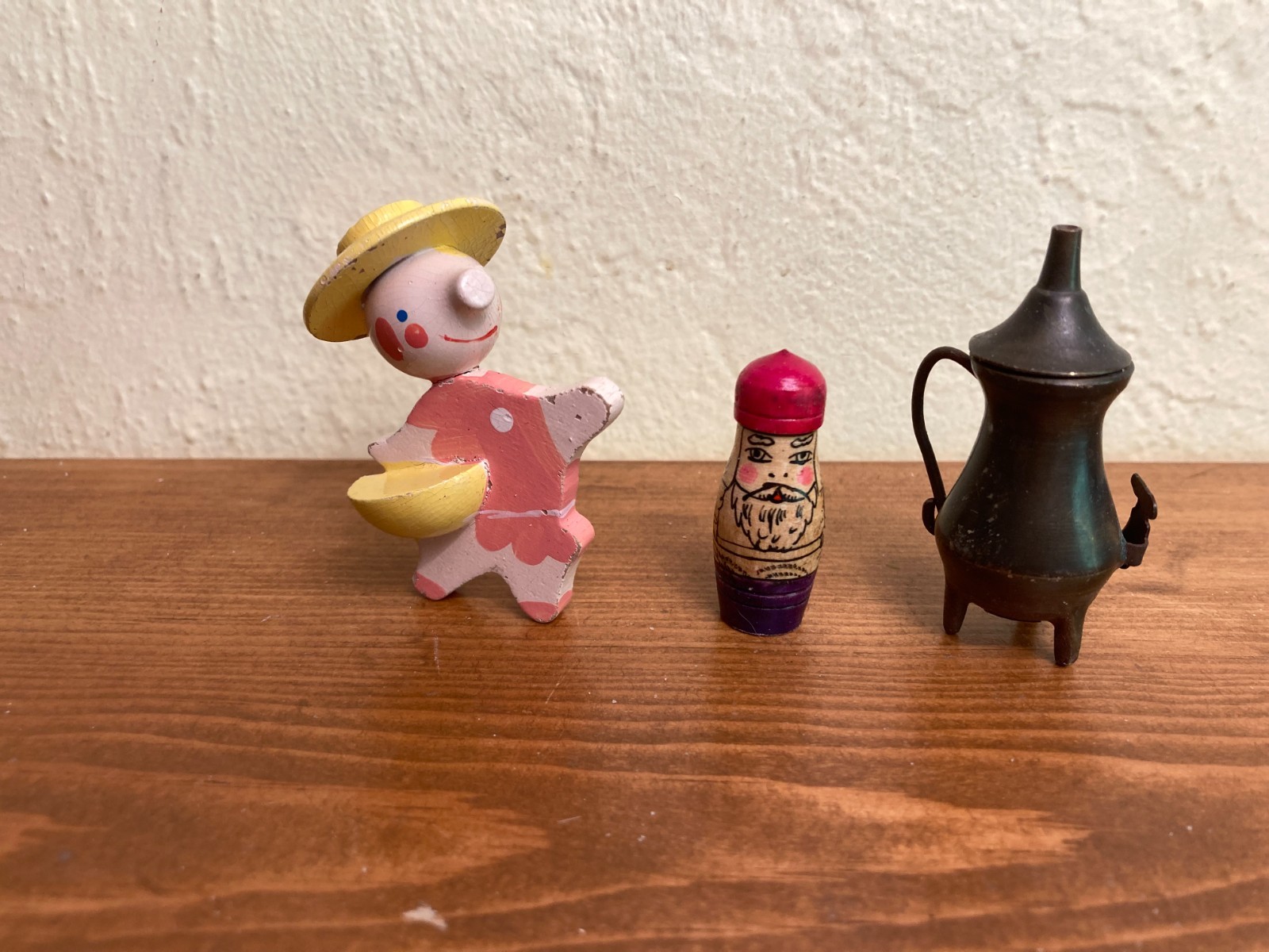 Sand tray miniature figures pose questions about memory, childhood, and history