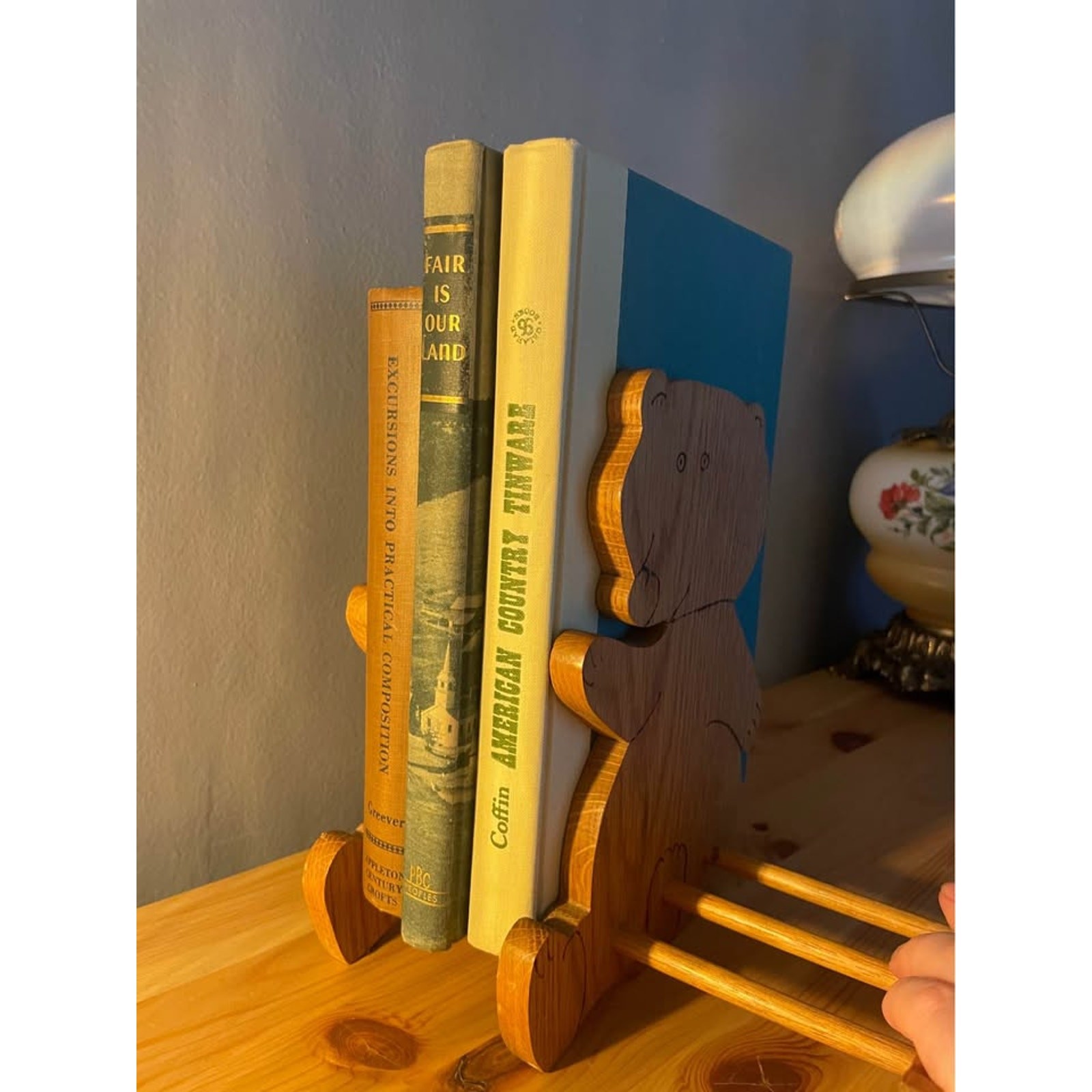 Vintage wooden bear book holder