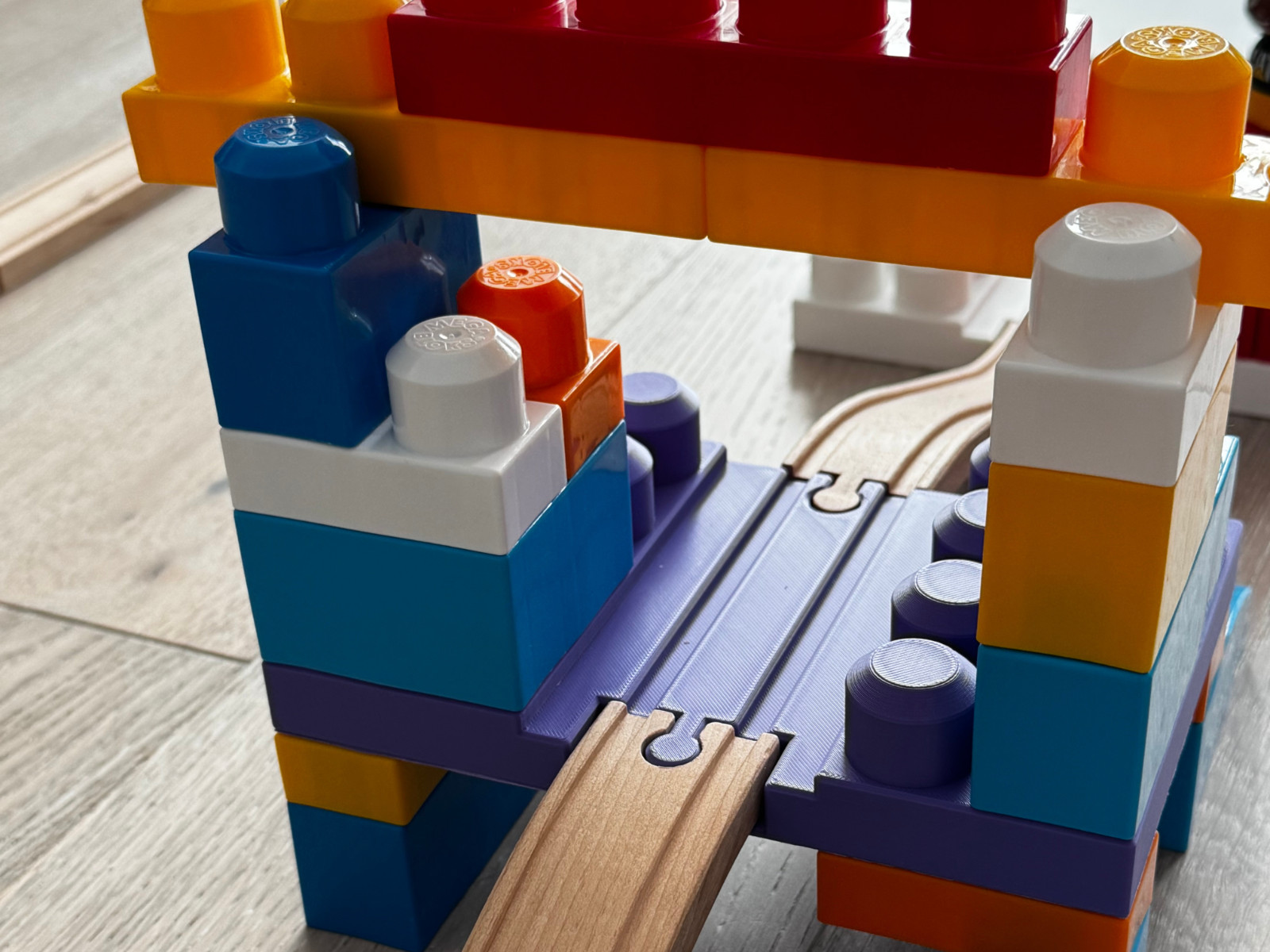 Large 2 x 4 two-sided Mega Bloks build plate with wooden train track