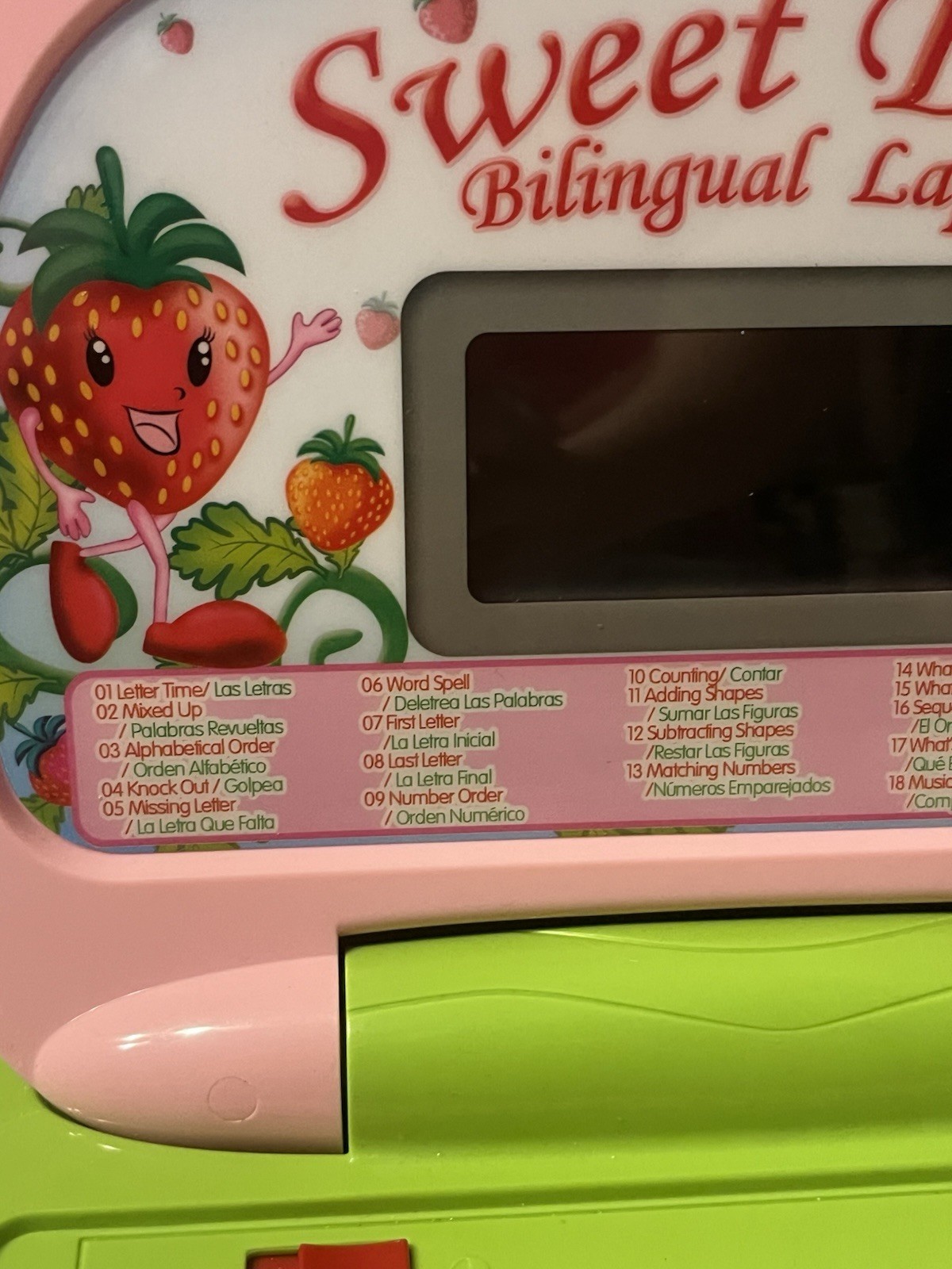 Strawberry themed Spanish and english bilingual learning toy laptop