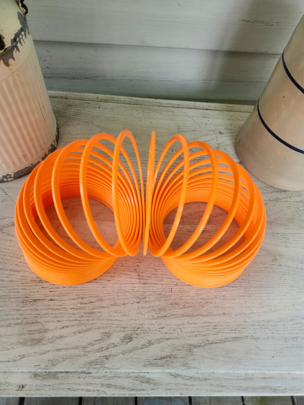 Giant Slinky – Green, Yellow, Orange or Pink 5.25″ diameter in opening, 5.25″ i