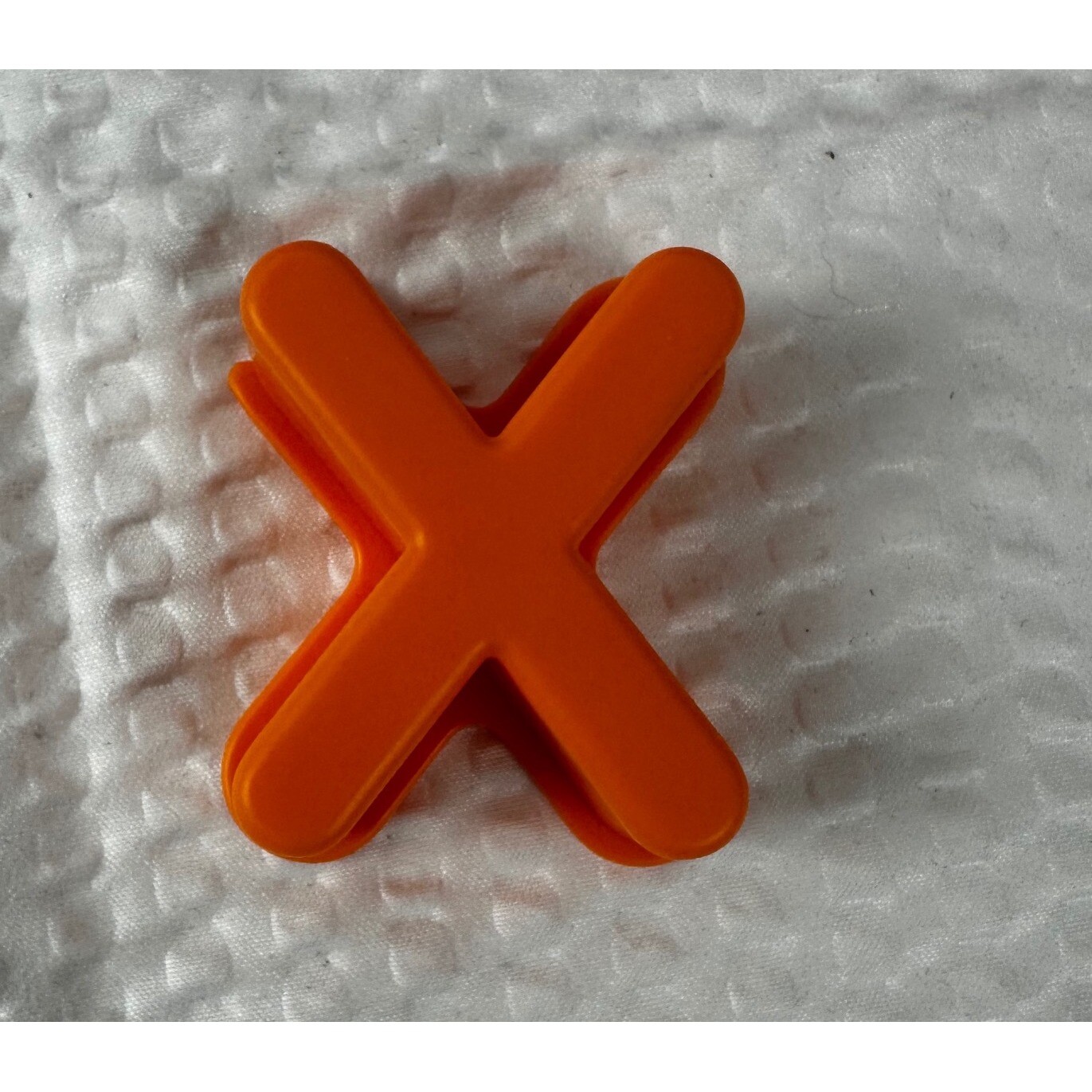 Letter “X” for Elmo On The Go learning game.