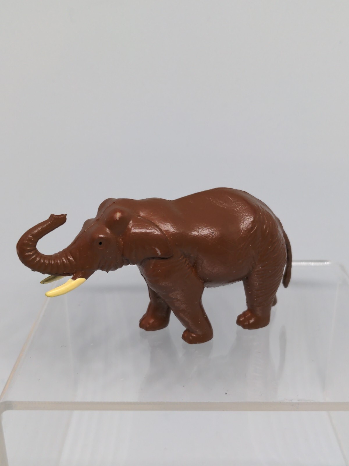Elephant Asian Replica plastic 3 inches long Dark Brown Tusk