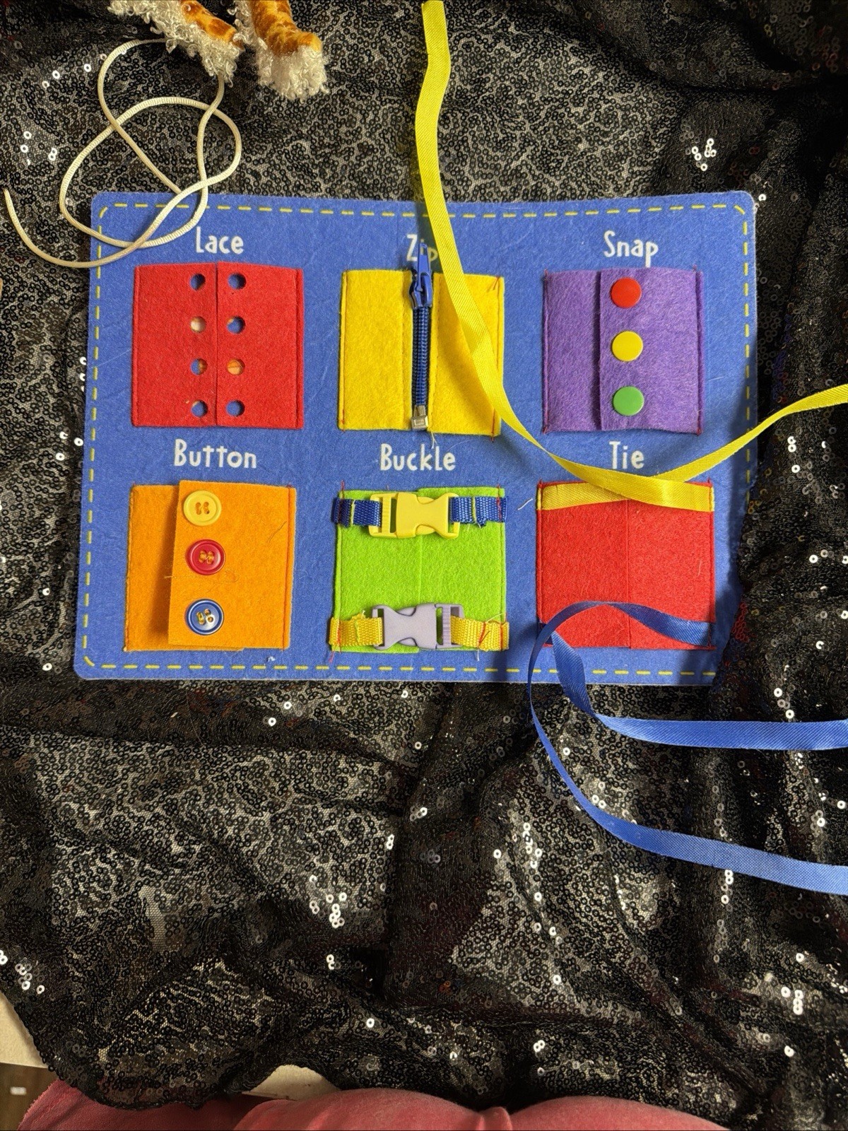 Busy Board to learn zippers buttons laces buckles ties snaps