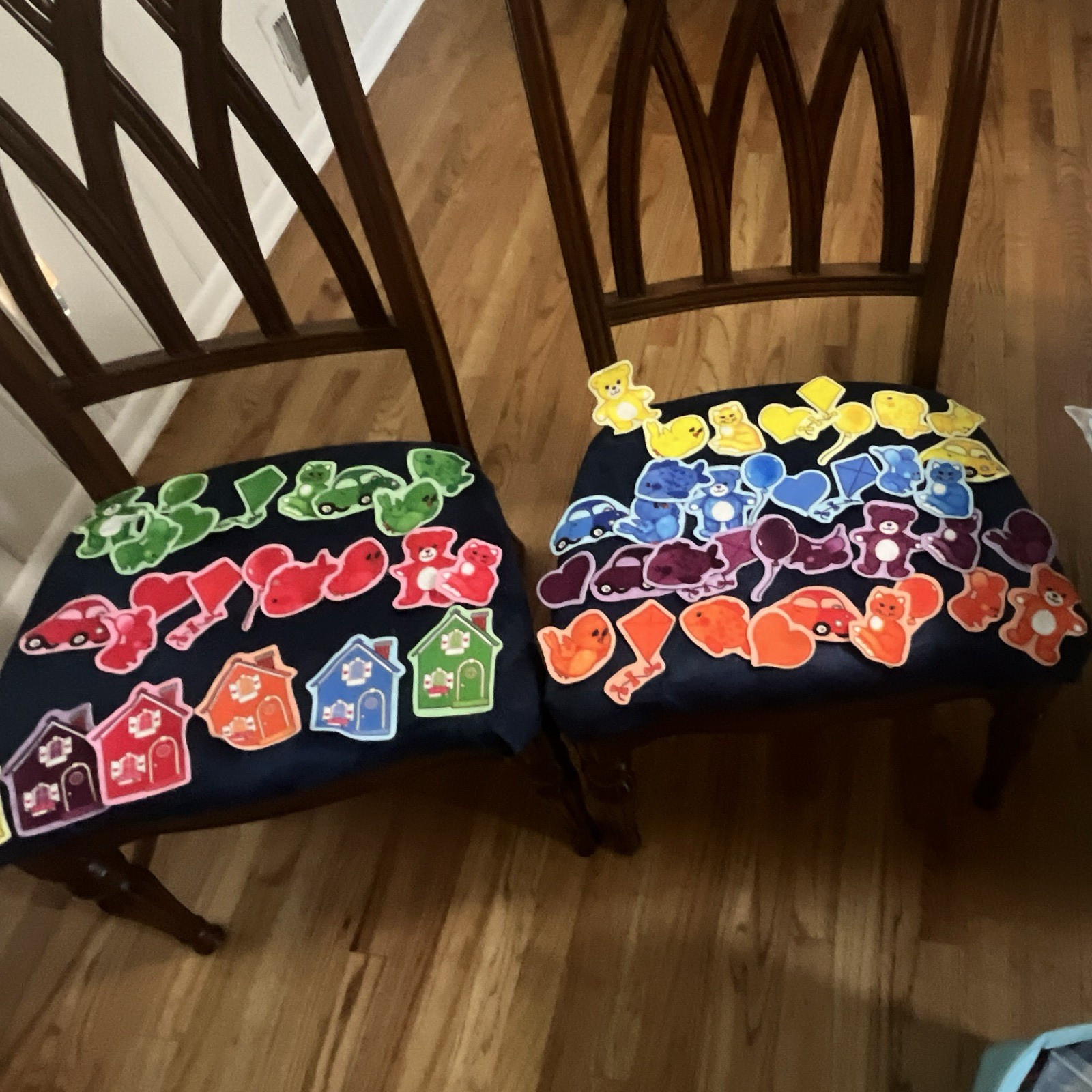Felt manipulative pieces- 60 pieces in different colors- birds, cars, houses etc