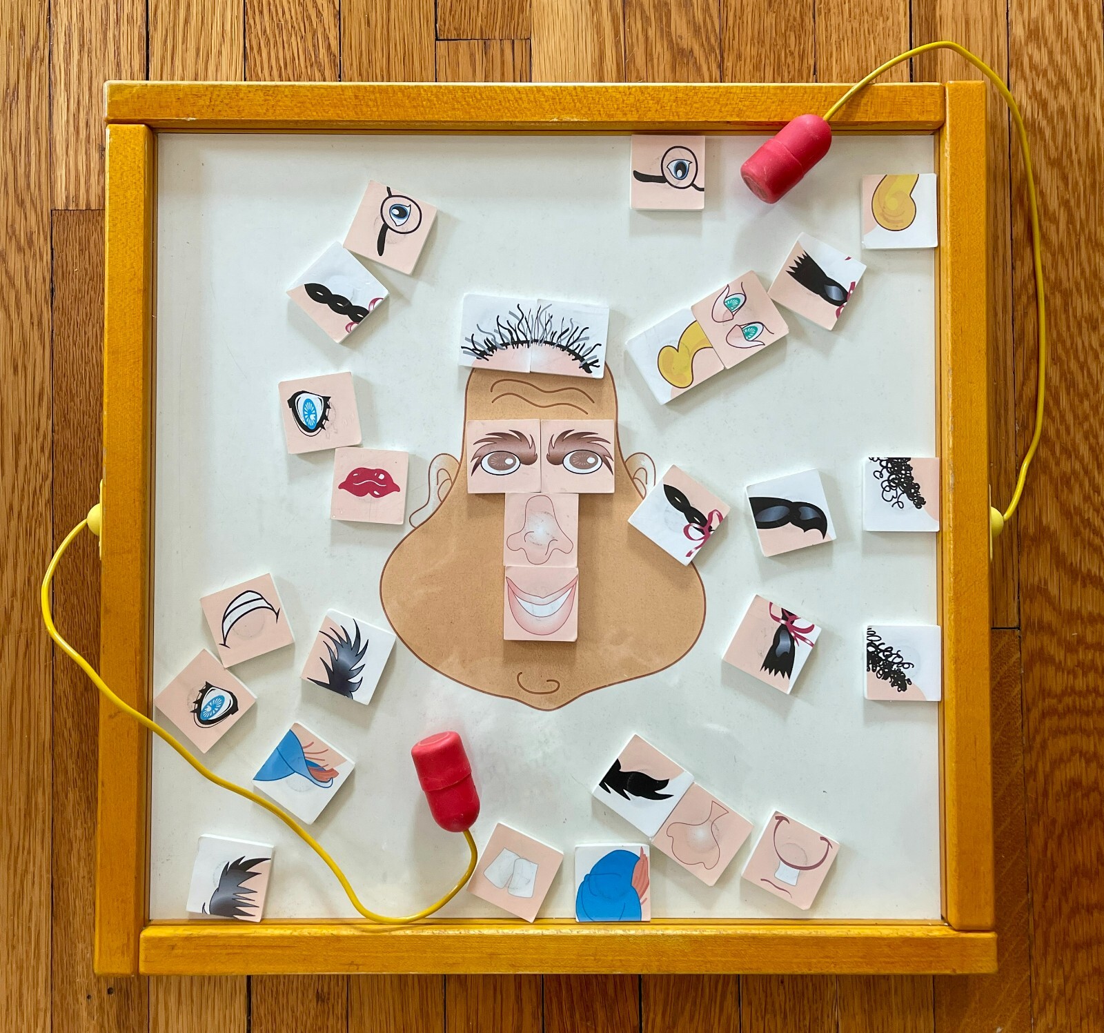 Magnetic Mix-Ups Funny Face Wall Game by The Children’s Furniture Company