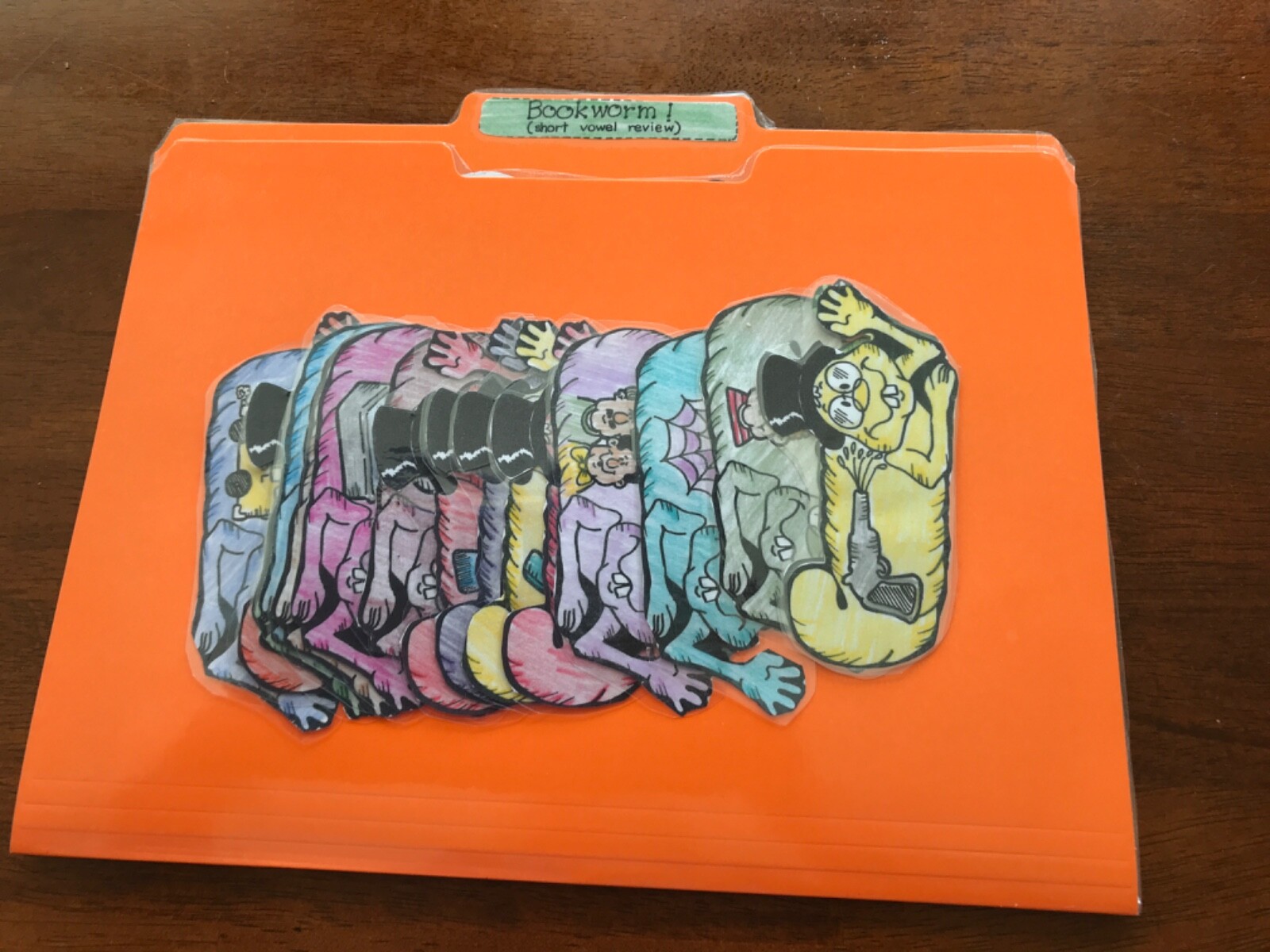 Bookworm! Short vowel review 1st Grade language arts file folder game teacher