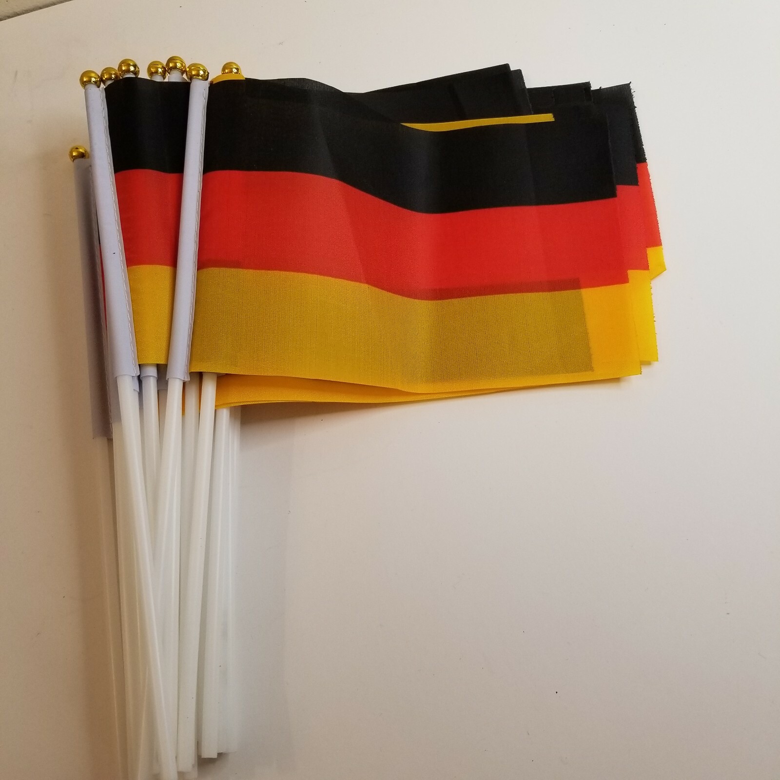 25 Plastic Tabletop German Flags, Approx. 12″ Tall
