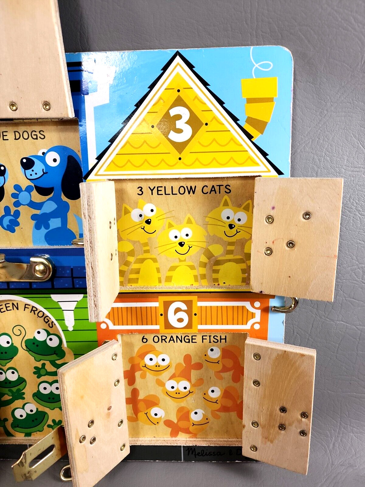 Melissa & Doug Learning -Latches, Buckle, Hook, Numbers, & Colors Activity Board
