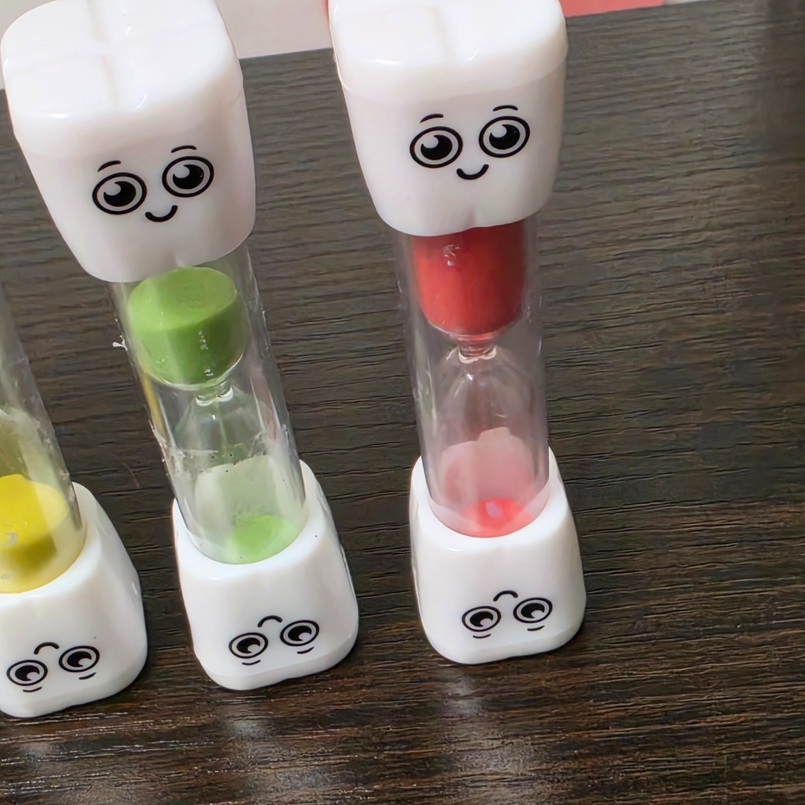 SuLiao toothbrush sand timers designed for children with various uses.