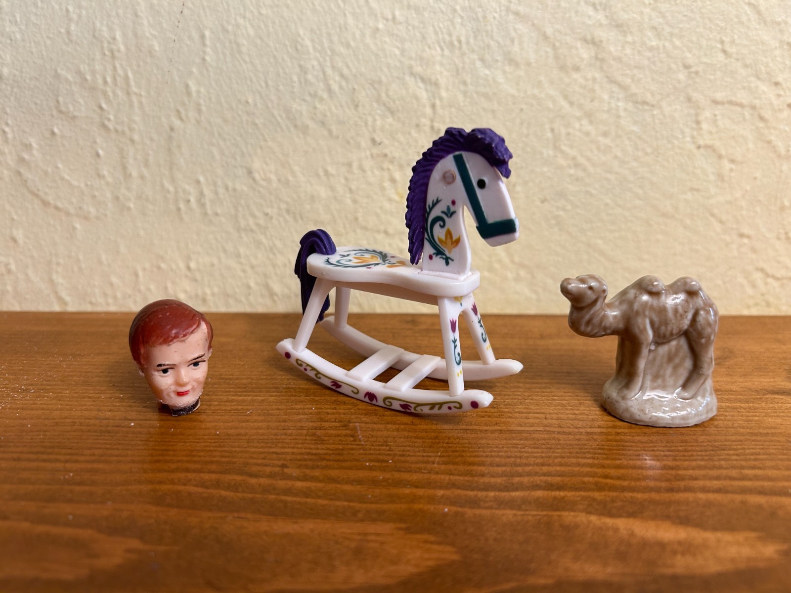 Dozen sand tray figures focus on change, challenges, growth, and stability